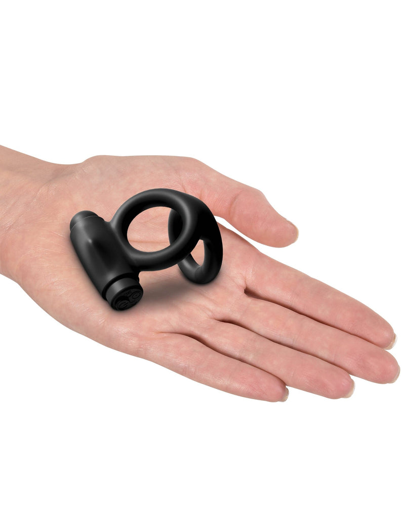 Vibrating Cock Ring holding toy in the hands