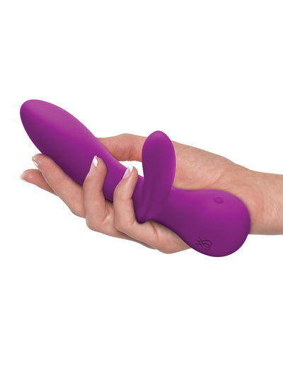 Front-facing rabbit vibrator violet in white women's hand